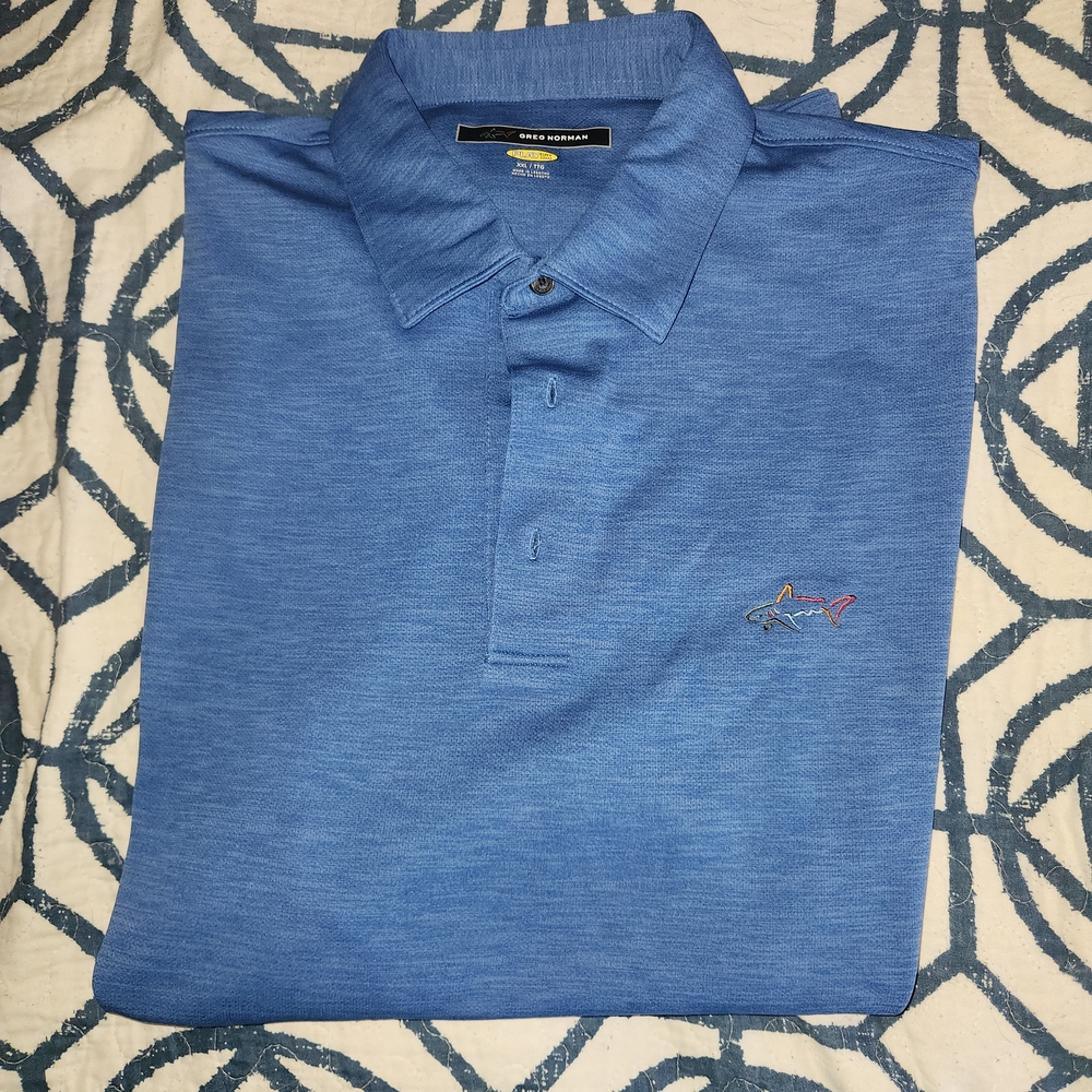 Greg Norman Collection Men's Heather Blue Polo with Shark Logo